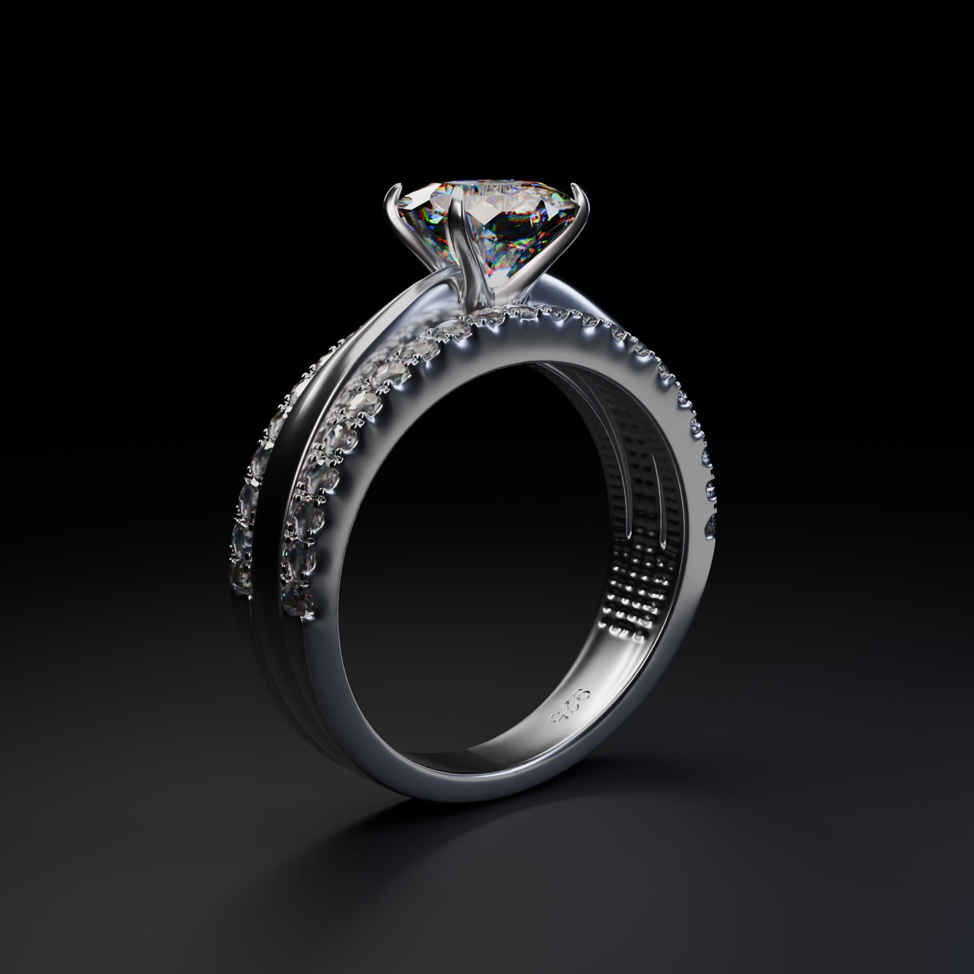 Another side angle of the solitaire ring, catching the light across the band.